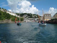 sailing boats going out from Looe